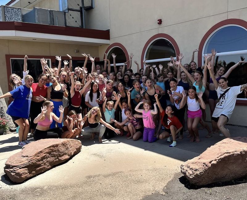 Summer camp group outside the studio