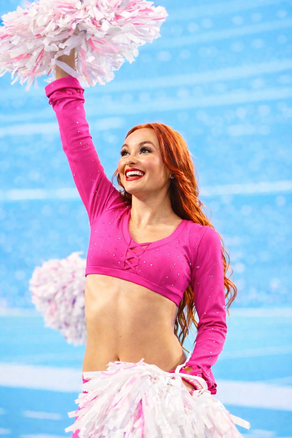 Shariah True cheering on the NFL sidelines